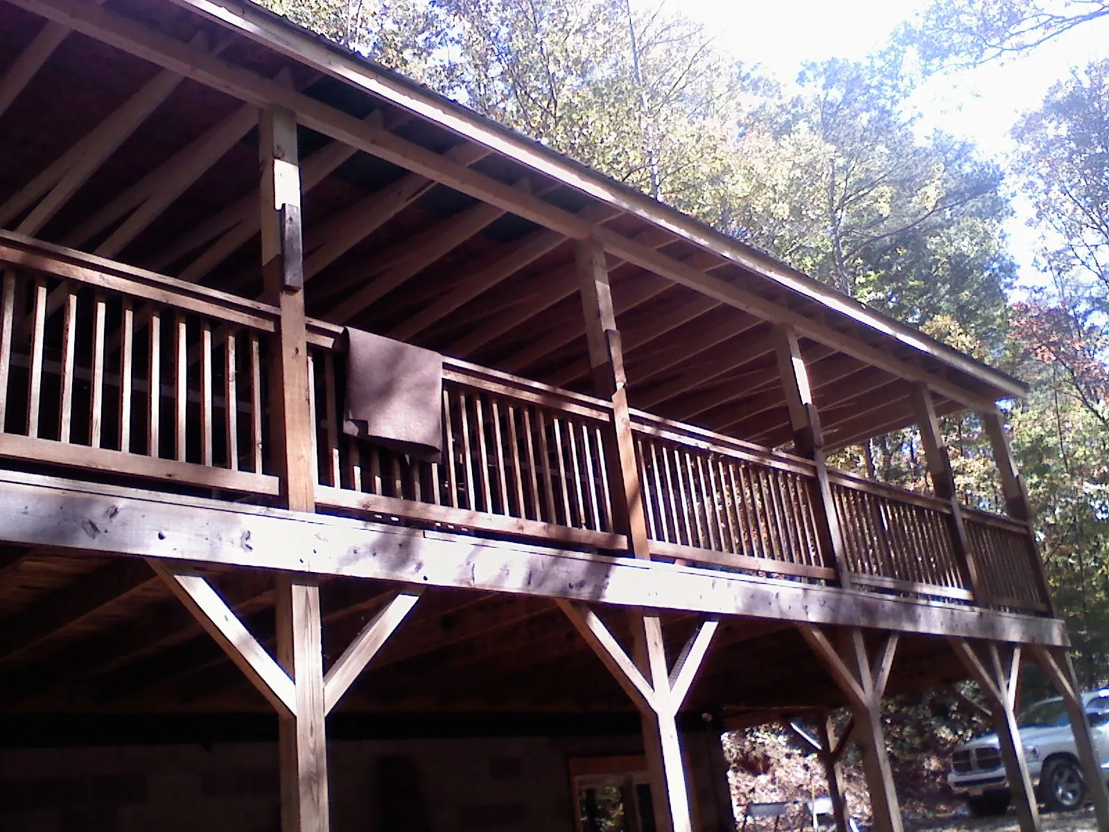 Timber framing under a new elevated porch and deck — Roof Leak Repair in Readsboro by Roofing Brothers
